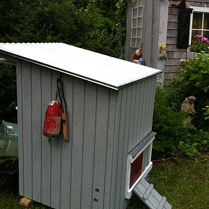 The coop matches the shed