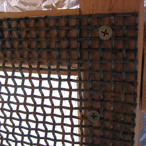 All of the shuttered windows and the Restore window are covered with this open diamond plate screening that we got from the salvage yard.  This is about as predator proof as we could get.