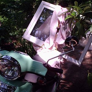 Found a perfect little window at the local ReStore and brought it home on my scooter.  Who needs a gas-guzzler?