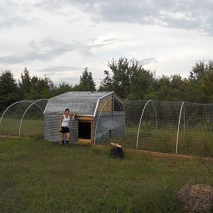 My beautiful wife modeling the new coop for me lol
