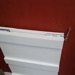Top angle of chicken door that shows the locks better