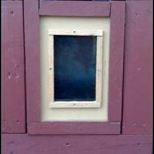 Pop door painted and a little window installed for added light. Their own little room with a view.