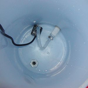 Insulated 5 gallon water bucket pump inside