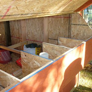 This is a view from the back of the coop.  The door can be raised for easy access to the nesting boxes to remove eggs without having to go inside the coop or the chicken run.