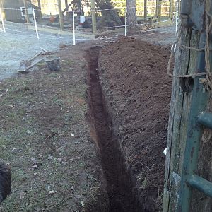 Part one of digging a trench for hydro and electric fence