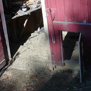 Chicken door in barn door