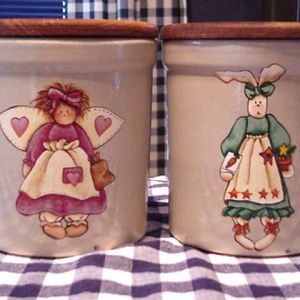 A country angel and country bunny crock. I used to paint these and sell them through Country Sampler Magazine.
