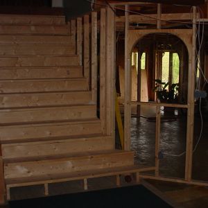 The new basement stairs framed and ready to drywall.