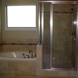 Tile shower and tub surround.