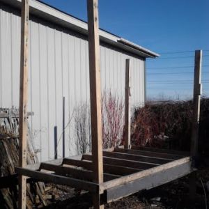 day one start of new coop build base is from an ice shanty. corner post are from pallets, they will be cut down to 4ft.