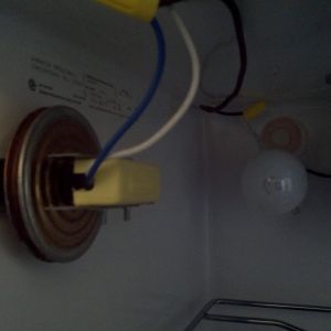 The interior side of the thermostat and the main heating bulb.