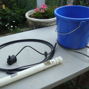 BUCKET 5 GAL W/HEATER  We use a THERMO CUBE IN THE OUTLET SO NO JUICE TILL BELOW 35 DEGREES F