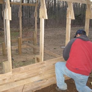 Hardwood (Maple, Red Oak, Yellow Birch) siding from local lumber mill. I buried siding 1' deep. I used 1 1/2" siding below ground and 1/2"  above.