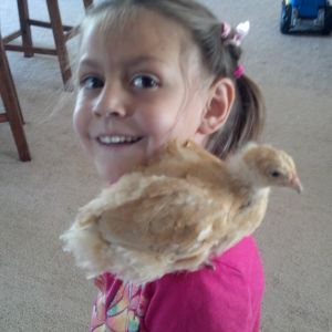 Daughter Esperanza with 1st chicken named Peanut Butter