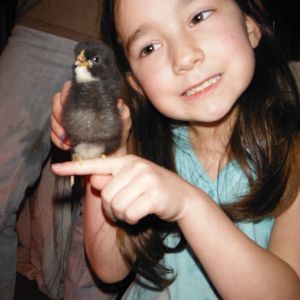 Lola holding "Lucille" (hopefully it's a Lucille :-)