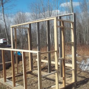 The major framing stuff is done, you can see the door opening for the greenhouse on the far side.  The cross members are made from the cull lumber I got from the local HD, 2X2's mostly