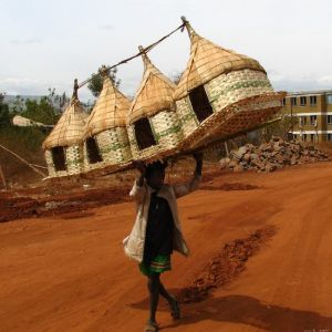 *
A boy carrying chicken coops, near Arba Minch, Ethiopia