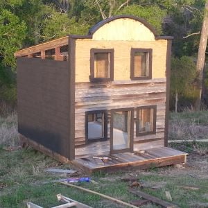 The side that will be adjoining the next coop has been painted and completed.