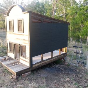 This is the side that will have the nesting boxes.  That's why you see the open area at the bottom.  They've not been built and attached, yet.