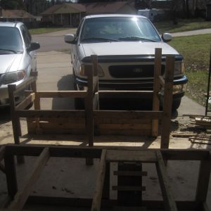 You can see in this photo where I have started to "Skin" the living area of the coop with fence planks I found.