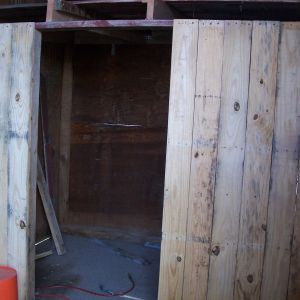 Outside of coop. (wall with door built in shed to make it into 2 rooms) More pics to come soon as we make more progress!