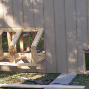 Frame for nesting boxes and door for chickens to go out to the run.