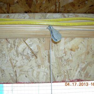 This pulley is above the pop door.
