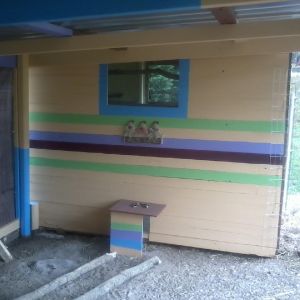 Painting inside of new coop now that the weather is warming up. 4/22/13