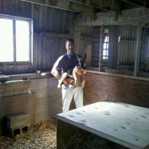 Me and Sadie in her kennel in the barn.