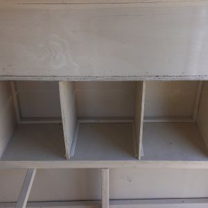 Nest boxes and dividers. I used quarter round on each side of the dividers as "bookends" so the dividers can be pulled out for easy cleaning.