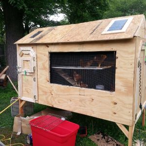 Walls and doors in place!  No window till we get it located in its final resting place.