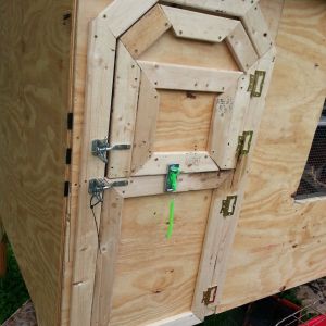 Dutch doors for the front of the coop, with gate latches and a security hasp.  We let the girls out the bottom door to range, and use the top for treats or filling the feeder.