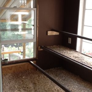 New poop board with sand under roosts had to be moved back to the other window. Chickens kept roosting in nesting boxes at night 
:(
