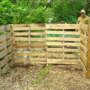 pallets screwed together to form fence around run and nesting box, free