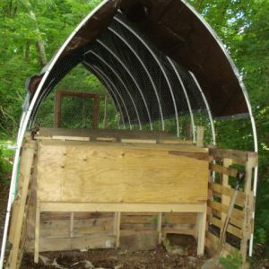 chicken wire attached to pvc pipe and surrounding entire coop