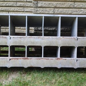 Free metal 12 nest boxes x 2 given to me by my mother.  They need cleaning up and wood on back replaced, but other than that trying to figure out how best to incorporate them.  I do NOT plan on having enough hens to utilize these boxes, so I'm beginning to wonder if they're even worth incorporating....

Front side view