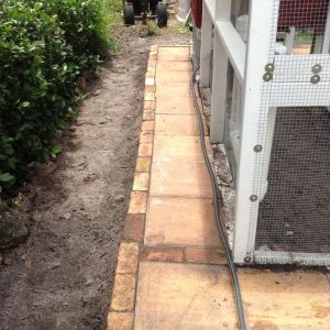 Back of coop after placing pavers.