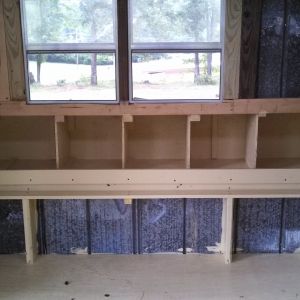 Here are the nesting boxes built and painted except for one divider, I have to make another trip to the hardware store.