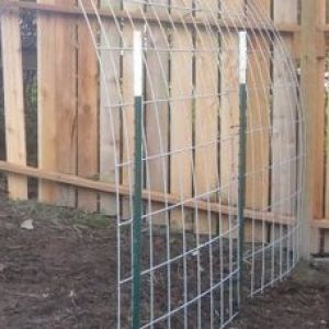 Panels secured to the T posts with wire and zip ties.