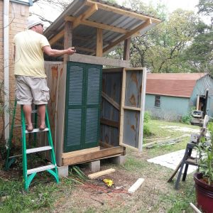 We had no idea what we were building other than it needed four walls & ventilation.  About 90% of the house is recycled.  This is my baby brother on the ladder....  telling me what to do & philosophy of life...  I think by the age I am at, I got a handle on life.