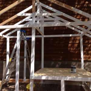 I started painting & we put the floor of the henhouse down using 1/2" plywood raised 2 feet off the ground.