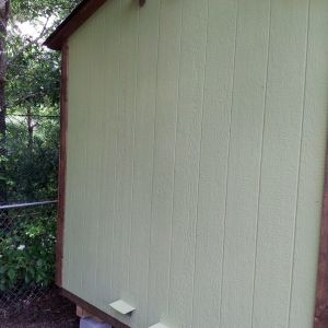 Circular vents cut out, with covers installed and wire cloth over the holes