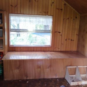 The window seat will be used for storage of the pine shaving a DE underneath and the poop boards will be placed on top.