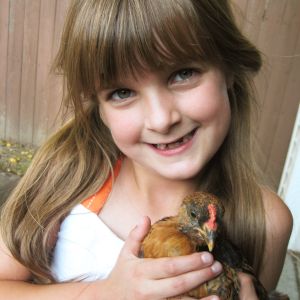 My daughter holding Brownie