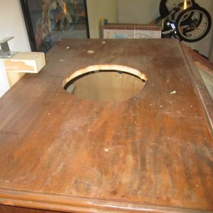 hole cut in top for heat lamp and tether mount to secure to wall.  It's a little front heavy