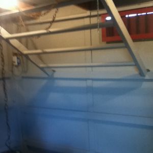 Roosts that will raise and lower (raised to the ceiling now because chicks are in a smaller coop underneath (a dear dad design!)