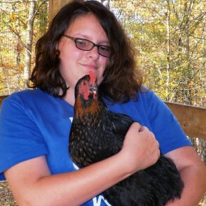 *
Lilli LOVES our chickens!