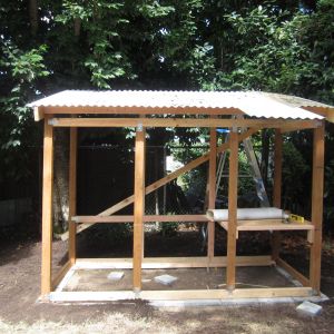 Plastic corrugated roof, with an overhang on one side