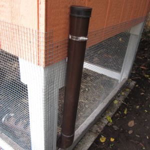 Feeding system. **Needs to be a bit wider, the feed doesn't quite slide down the tube and we have to bang on it to get it to fill up