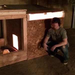 My brother Sheth Garcia wanted to pose with the new coop.